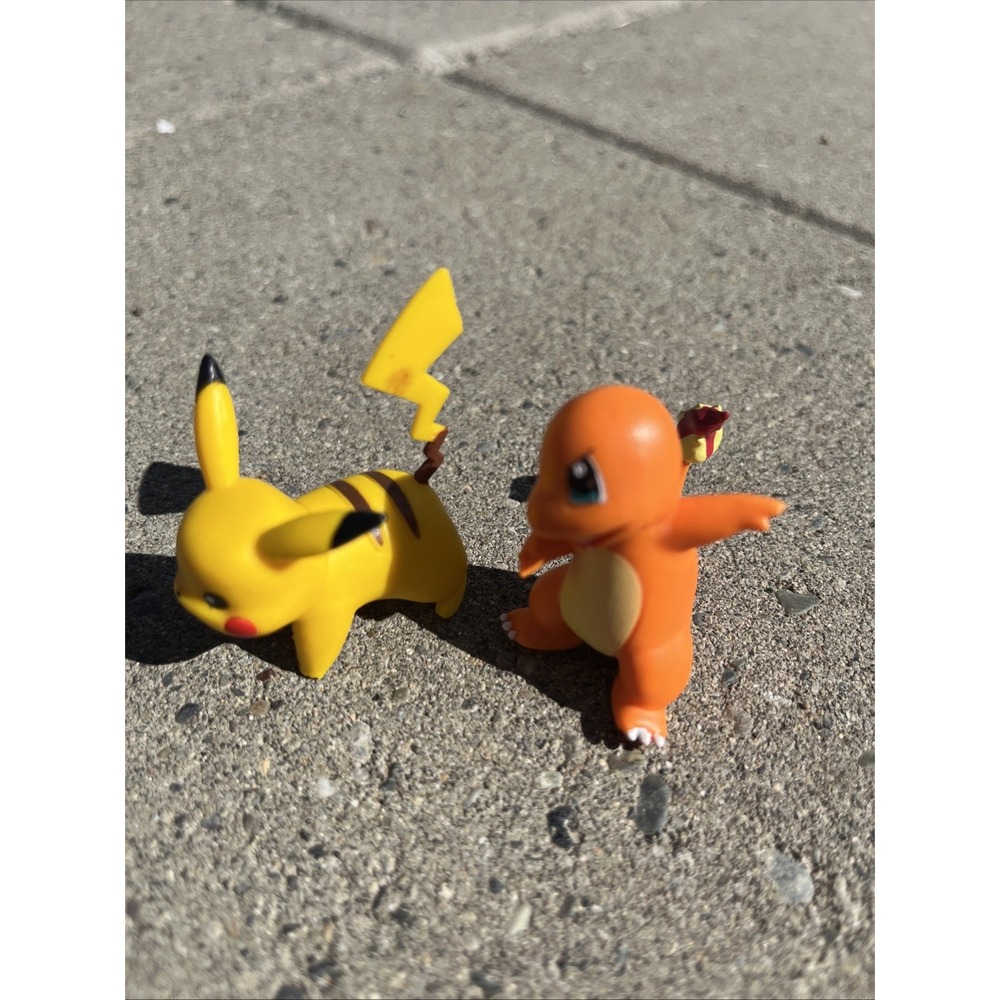 Charmander action figure, a popular Pokémon  2 Lot Pikachu